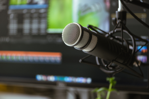 Microphone,On,The,Background,Of,The,Computer,Monitor.