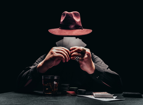 Photo,Of,A,Shaded,Gangster,In,Black,Shirt,And,Hat